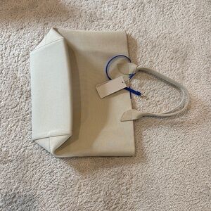 Rothy's Cream Canvas Tote with Blue Accent Strap
